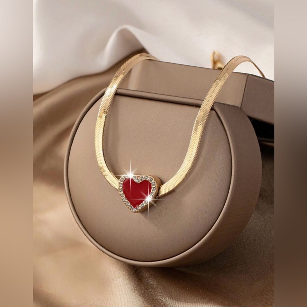 A Snakeskin Chain, Heart Set With Rhinestones, Oil Drop Pendant